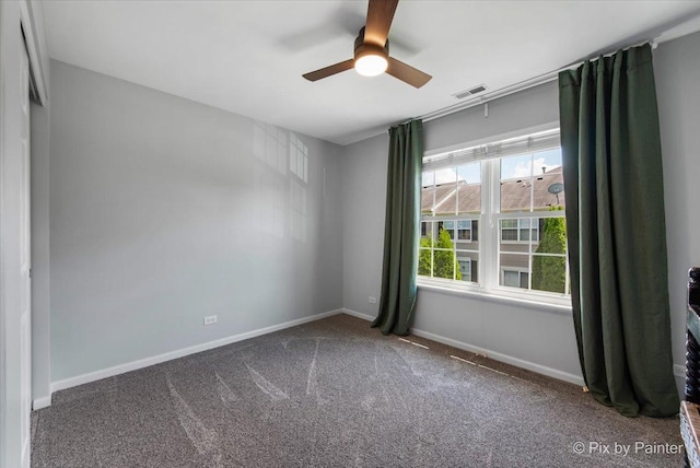 561 S Jade Ln Unit 1106, Round Lake, IL 60073 - carpeted empty room with a ceiling fan and baseboards