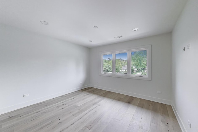 5830 Brookbank Rd, Downers Grove, IL 60516 - unfurnished room with light wood finished floors and recessed lighting