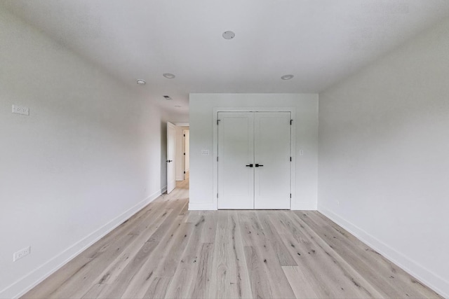 5830 Brookbank Rd, Downers Grove, IL 60516 - unfurnished bedroom featuring light wood-style flooring and a closet