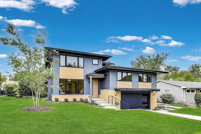 5830 Brookbank Rd, Downers Grove, IL 60516 - modern home featuring a front lawn, an attached garage, and driveway