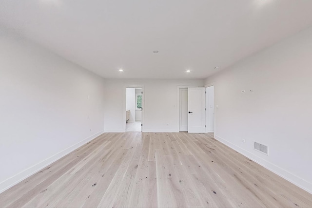 5830 Brookbank Rd, Downers Grove, IL 60516 - empty room with light wood-type flooring and recessed lighting