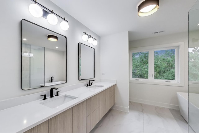 5830 Brookbank Rd, Downers Grove, IL 60516 - full bathroom with marble finish flooring, double vanity, and a freestanding bath