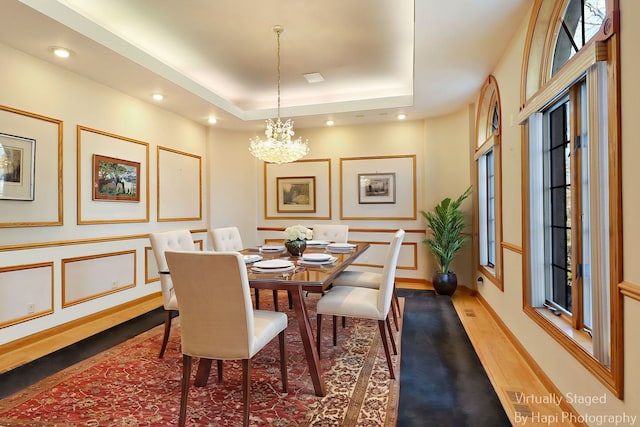 74 Dundee Ln, Barrington Hills, IL 60010 - dining room with a chandelier, a tray ceiling, and recessed lighting