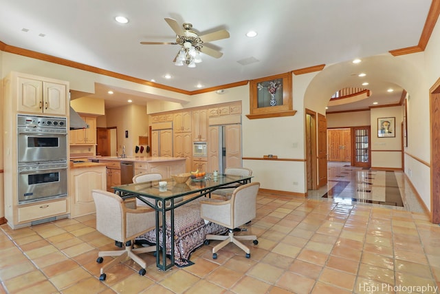 74 Dundee Ln, Barrington Hills, IL 60010 - dining space with ornamental molding, arched walkways, ceiling fan, recessed lighting, and light tile patterned floors