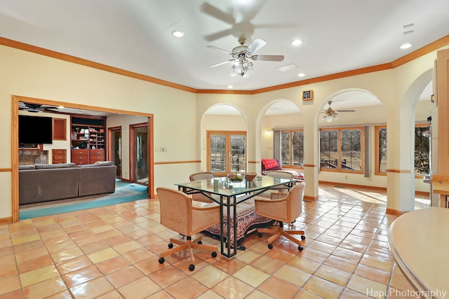 74 Dundee Ln, Barrington Hills, IL 60010 - dining space with a ceiling fan, arched walkways, ornamental molding, recessed lighting, and light tile patterned floors