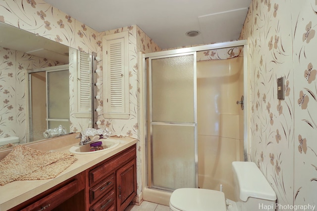 74 Dundee Ln, Barrington Hills, IL 60010 - bathroom with wallpapered walls, vanity, a stall shower, and tile patterned floors