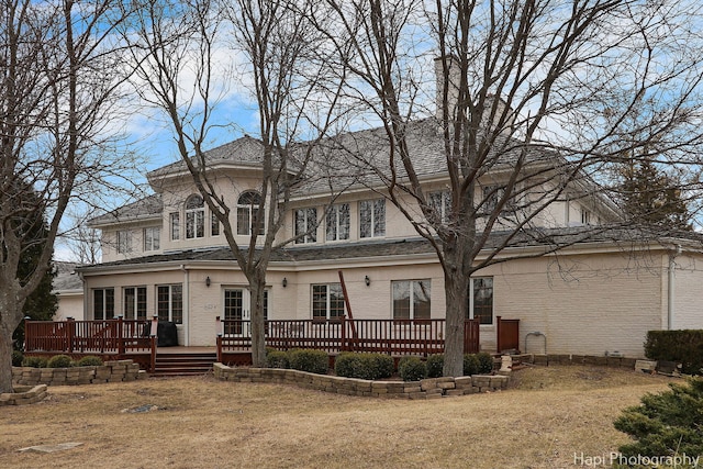 74 Dundee Ln, Barrington Hills, IL 60010 - view of front facade with a deck and a front lawn