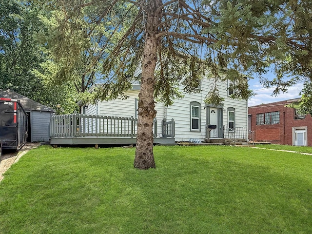 821 W Douglas St, Freeport, IL 61032 - view of front of home with a front yard and a deck