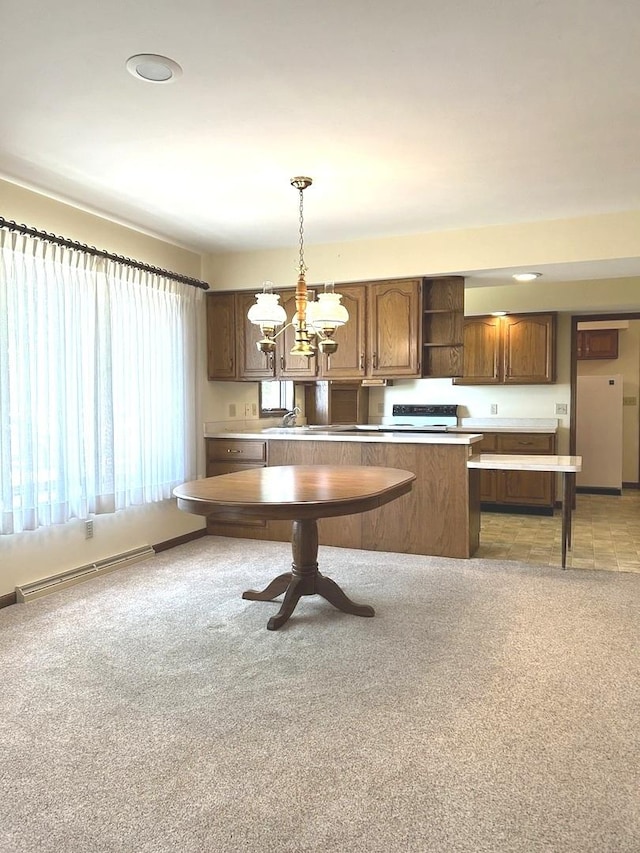 70 N Main St, Lamoille, IL 61330 - kitchen with decorative light fixtures, light countertops, a chandelier, open shelves, and range