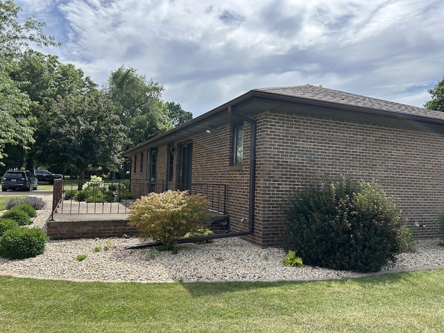 70 N Main St, Lamoille, IL 61330 - view of property exterior featuring brick siding