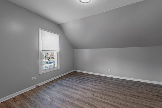 6944 S Racine Ave, Chicago, IL 60636 - additional living space featuring vaulted ceiling and dark wood-style flooring
