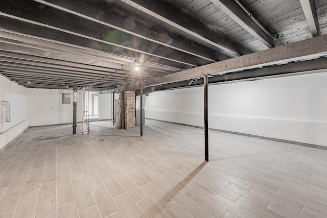 6944 S Racine Ave, Chicago, IL 60636 - basement with baseboards and wood finished floors