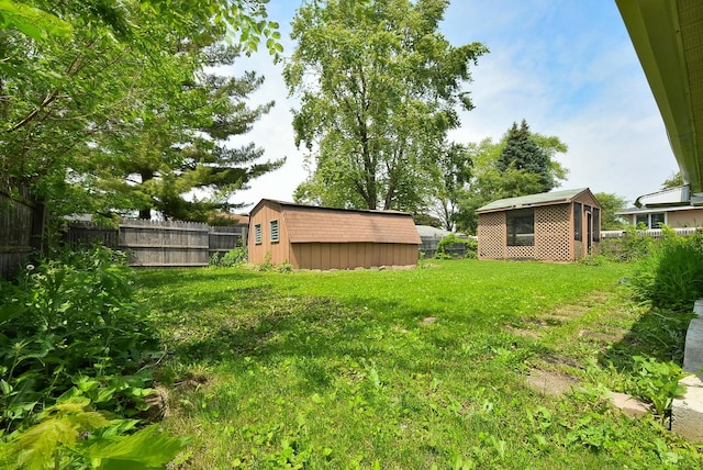 50 Ridgewood Rd, Elk Grove Village, IL 60007 - fenced backyard featuring an outbuilding