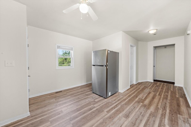 2133 Luther Ave, Lockport, IL 60441 - kitchen featuring freestanding refrigerator, light wood-style flooring, and ceiling fan