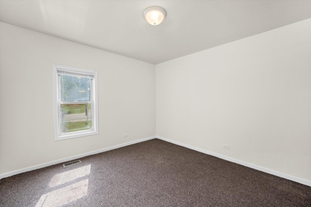 2133 Luther Ave, Lockport, IL 60441 - spare room with dark colored carpet and baseboards