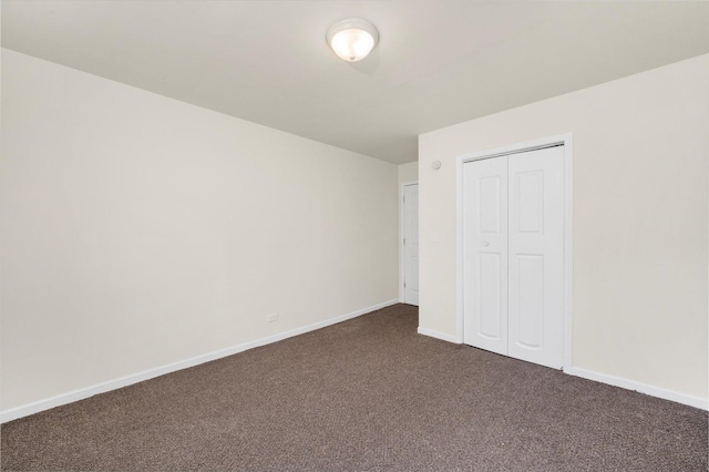 2133 Luther Ave, Lockport, IL 60441 - unfurnished bedroom with dark carpet and a closet