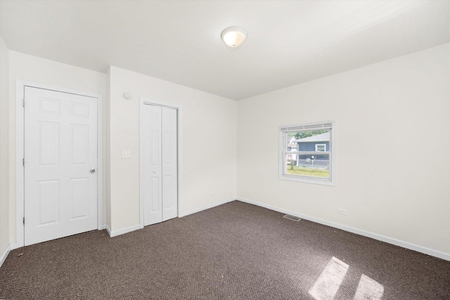 2133 Luther Ave, Lockport, IL 60441 - unfurnished bedroom with dark carpet and a closet