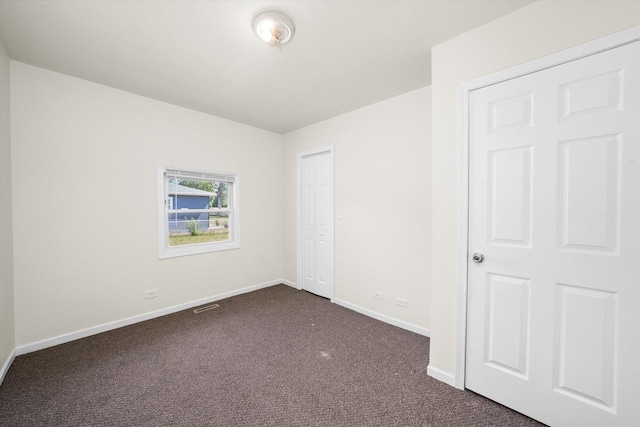 2133 Luther Ave, Lockport, IL 60441 - unfurnished bedroom with dark carpet and a closet