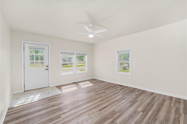 2133 Luther Ave, Lockport, IL 60441 - empty room with light wood-style floors and a ceiling fan