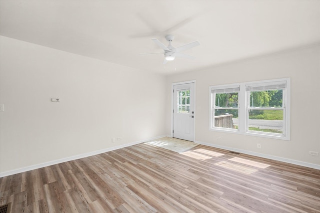 2133 Luther Ave, Lockport, IL 60441 - unfurnished room with light wood finished floors and a ceiling fan