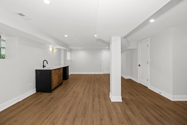 8114 S Paxton Ave, Chicago, IL 60617 - indoor wet bar featuring recessed lighting and light wood-style flooring