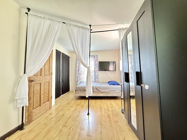 311 Edinburgh Dr, Lockport, IL 60441 - bedroom featuring light wood-type flooring and baseboards