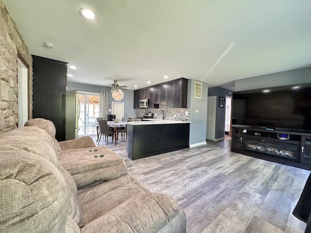 311 Edinburgh Dr, Lockport, IL 60441 - living room with light wood-type flooring, ceiling fan, and recessed lighting