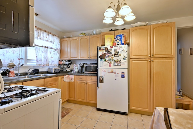 kitchen featuring white appliances, light tile patterned flooring, light brown cabinets, a chandelier, and dark countertops