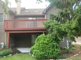 542 Silver Aspen Cir, Crystal Lake, IL 60014 - back of property featuring a balcony and a chimney