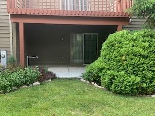 542 Silver Aspen Cir, Crystal Lake, IL 60014 - rear view of property featuring a lawn and a deck
