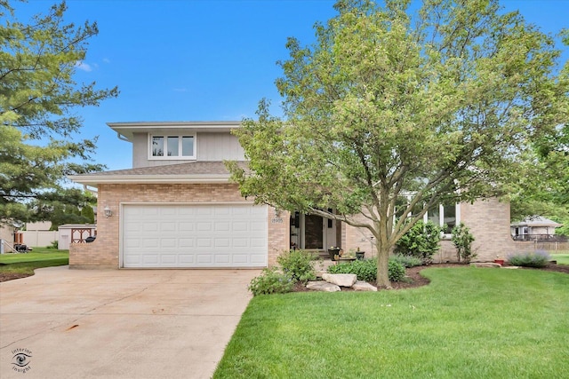 18905 Meadowview Dr, Mokena, IL 60448 - view of front of property featuring concrete driveway, a garage, brick siding, and a front yard