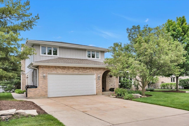 18905 Meadowview Dr, Mokena, IL 60448 - view of front of house with an attached garage, driveway, brick siding, and a front lawn