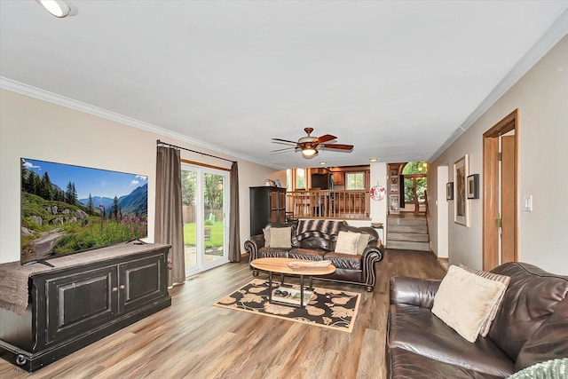 18905 Meadowview Dr, Mokena, IL 60448 - living area with wood finished floors, ornamental molding, a ceiling fan, and stairway