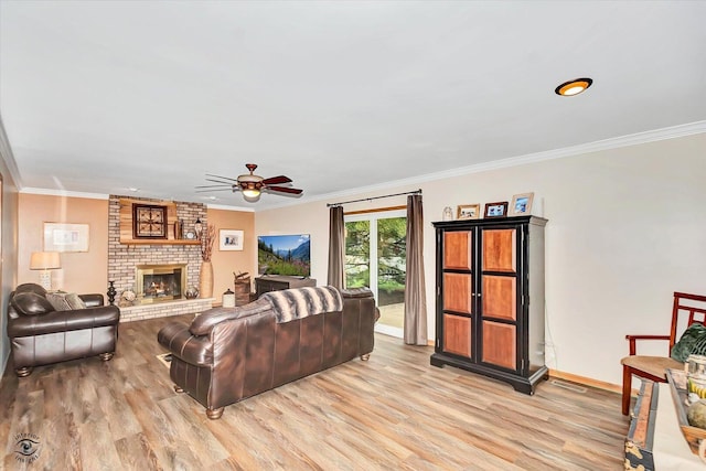 18905 Meadowview Dr, Mokena, IL 60448 - living area with light wood-style floors, a ceiling fan, crown molding, and a brick fireplace