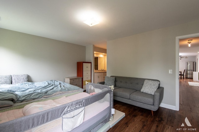 257 Coventry Cir Unit 136, Vernon Hills, IL 60061 - bedroom with freestanding refrigerator, wood finished floors, and ensuite bathroom