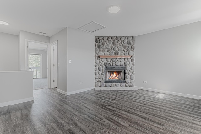 17357 W Maple Ln, Gurnee, IL 60031 - unfurnished living room featuring wood finished floors and a fireplace