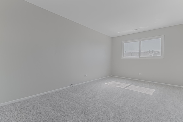17357 W Maple Ln, Gurnee, IL 60031 - carpeted spare room featuring baseboards
