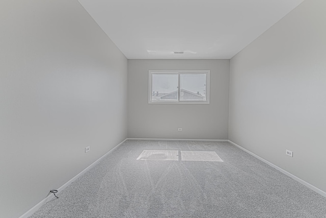 17357 W Maple Ln, Gurnee, IL 60031 - empty room featuring light carpet and baseboards