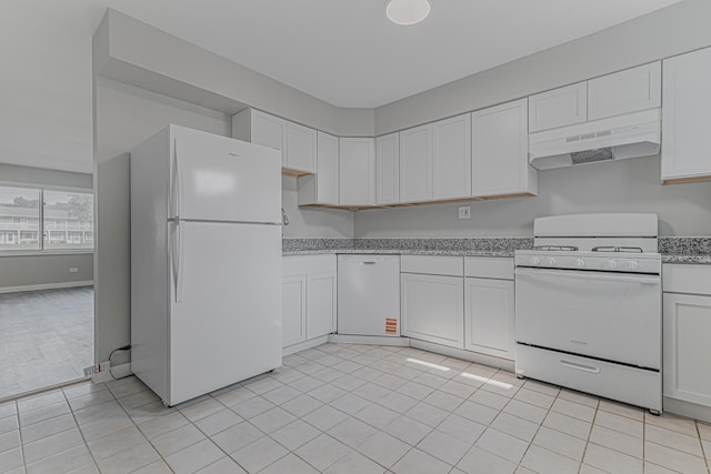 17357 W Maple Ln, Gurnee, IL 60031 - kitchen with white appliances, exhaust hood, white cabinets, and light tile patterned flooring