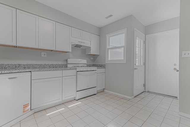 17357 W Maple Ln, Gurnee, IL 60031 - kitchen featuring white appliances, under cabinet range hood, white cabinetry, and light stone counters