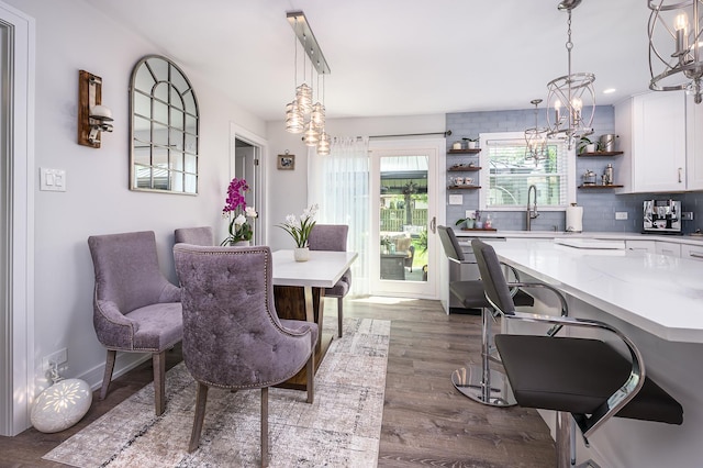1815 Evergreen Ave, Hanover Park, IL 60133 - dining space with wood finished floors, a chandelier, and recessed lighting