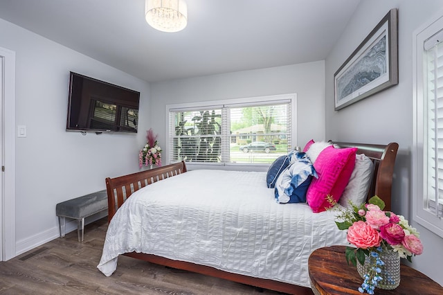 1815 Evergreen Ave, Hanover Park, IL 60133 - bedroom with wood finished floors and baseboards