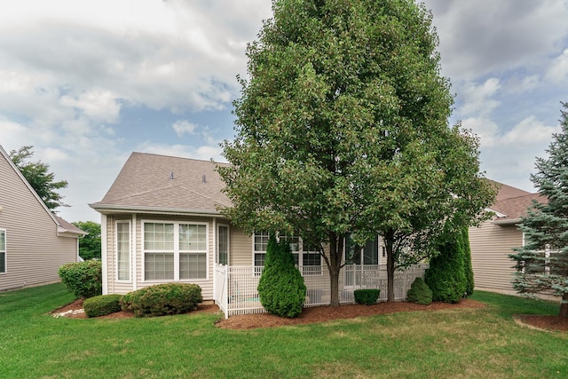 13445 Meadowlark Ln, Huntley, IL 60142 - view of front of house with a front yard and roof with shingles