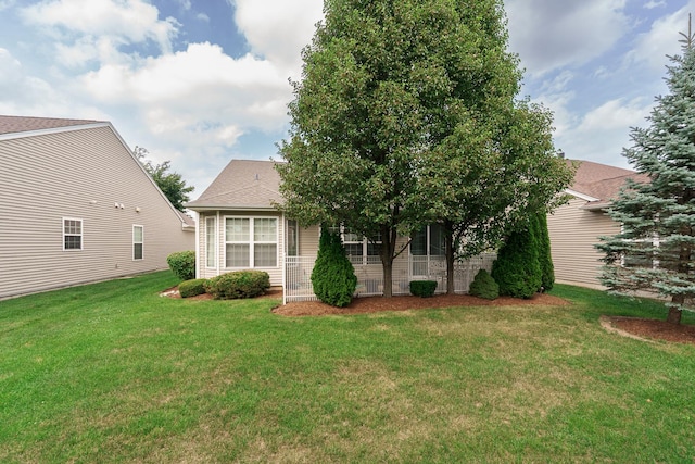 13445 Meadowlark Ln, Huntley, IL 60142 - rear view of house with a lawn and roof with shingles