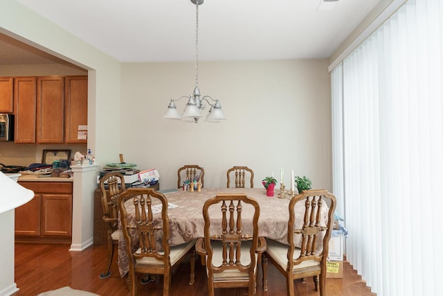 13445 Meadowlark Ln, Huntley, IL 60142 - dining area featuring light wood-style floors and a chandelier