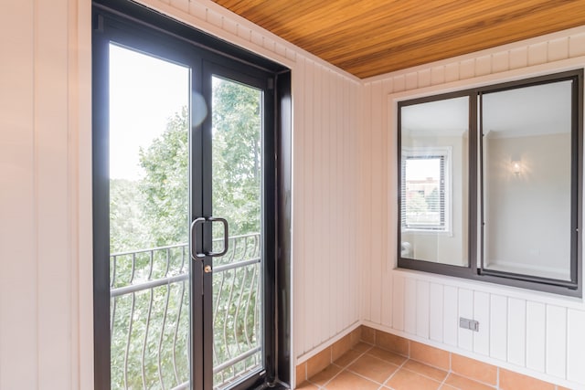 470 Fawell Blvd Unit 411, Glen Ellyn, IL 60137 - entryway with light tile patterned flooring, plenty of natural light, and wooden ceiling