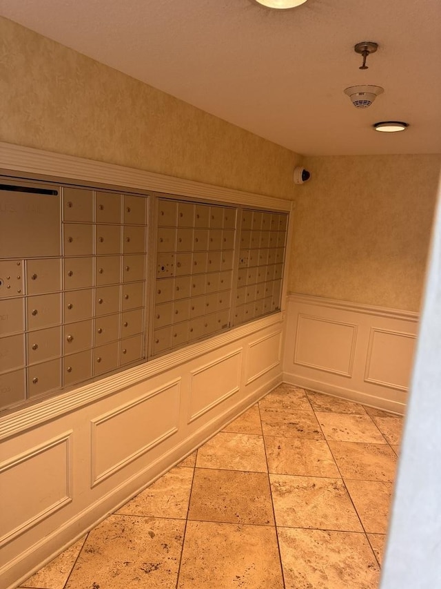 470 Fawell Blvd Unit 411, Glen Ellyn, IL 60137 - surrounding community with mail area, a wainscoted wall, and a decorative wall