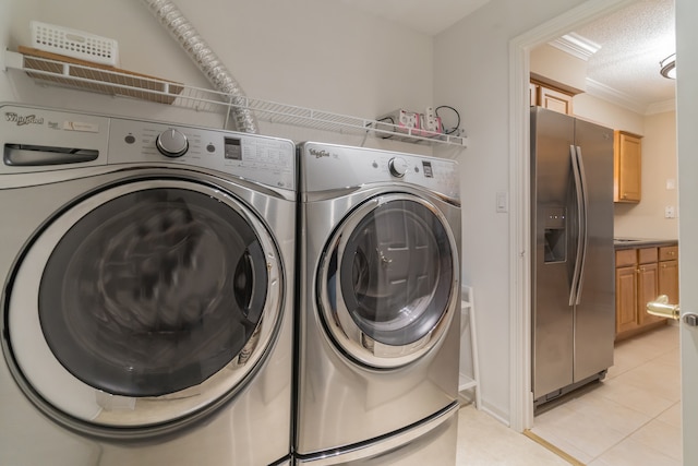 470 Fawell Blvd Unit 411, Glen Ellyn, IL 60137 - laundry room featuring independent washer and dryer, crown molding, light tile patterned floors, and a textured ceiling