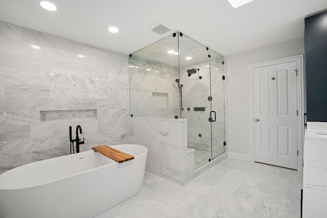 1225 N Paulina St Unit 3S, Chicago, IL 60622 - full bath with a soaking tub, a marble finish shower, marble finish floors, and recessed lighting