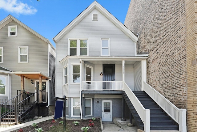 1629 W Foster Ave, Chicago, IL 60640 - view of front of property with stairway and covered porch